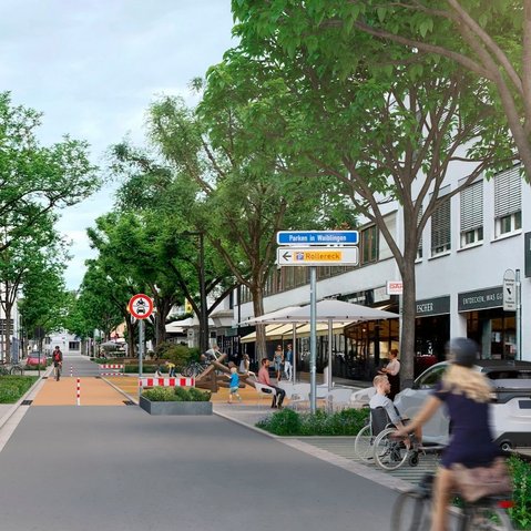 Stadtstraße mit Fußgängern, Radfahrern, Bäumen und Geschäften auf beiden Seiten.