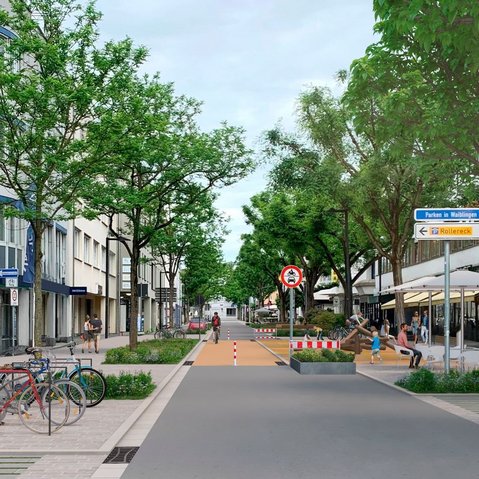 Stadtstraße mit Fußgängern, Radfahrern, Bäumen und Geschäften auf beiden Seiten.